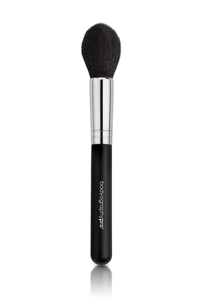 Soft synthetic tapered edge contour brush for face makeup by Bodyography SA