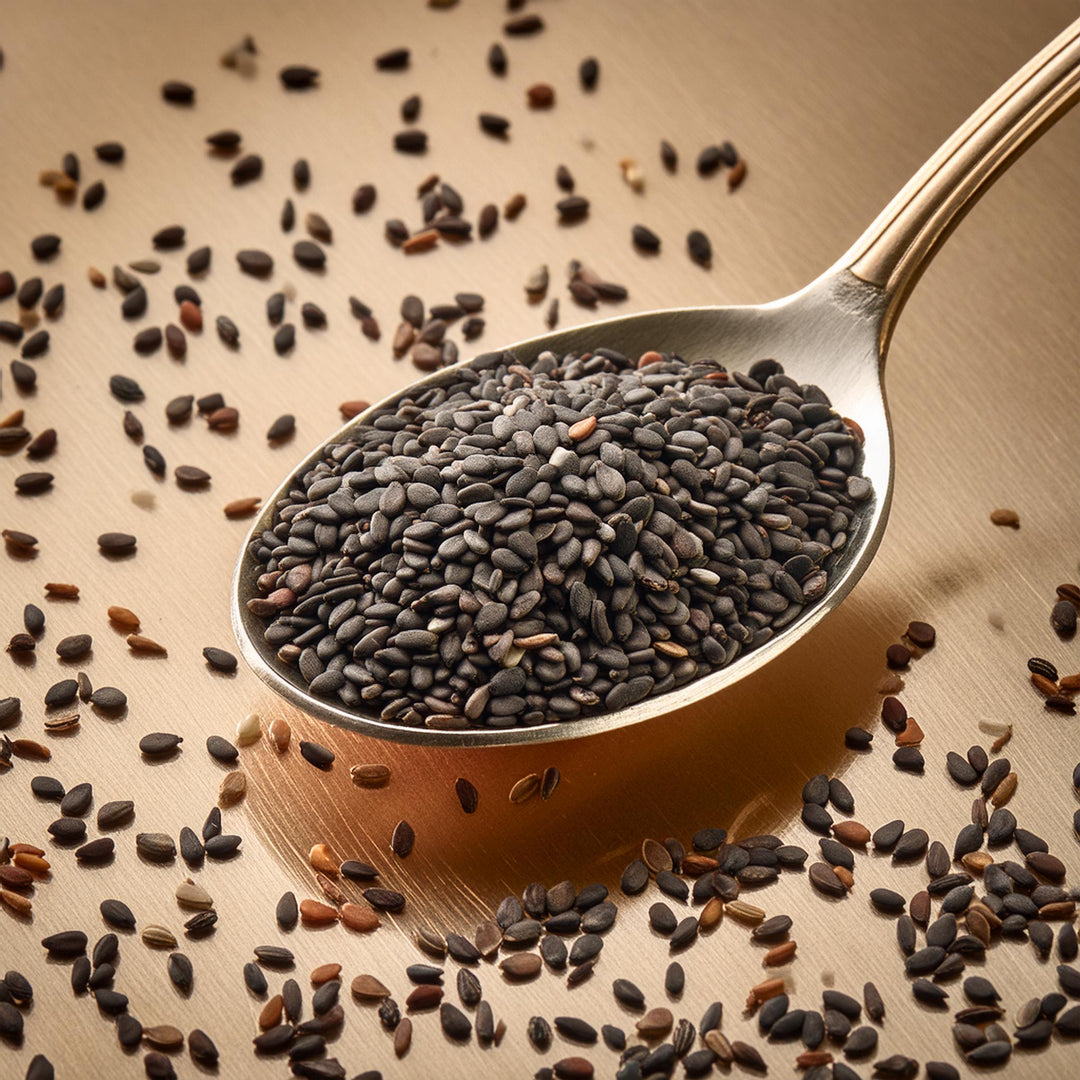 Premium raw hulled black sesame seeds in a 100g package by AGT for cooking and baking