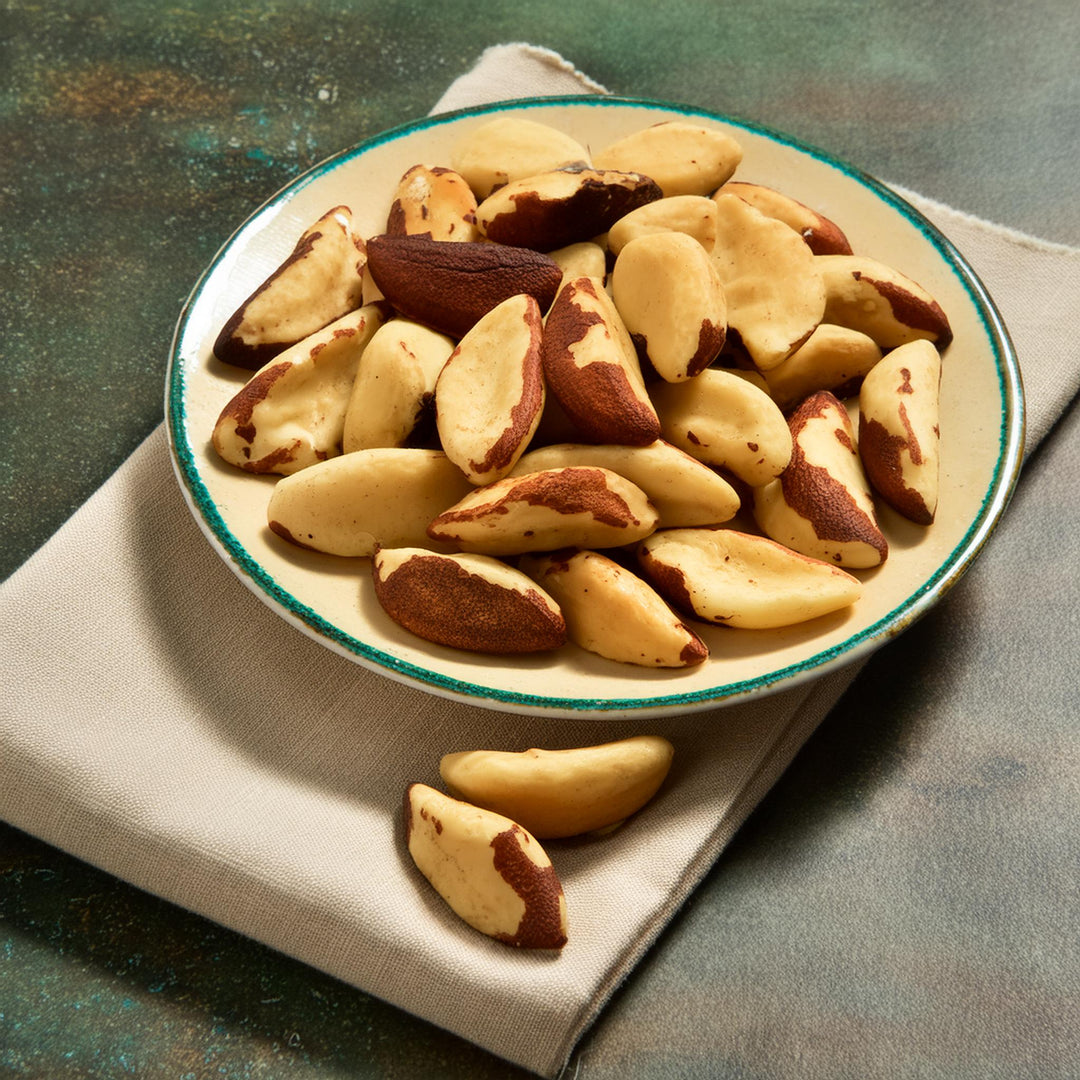 Premium raw Brazil nuts in a clear bag, rich in selenium, gluten-free, by MultiSnack, available in various weights.
