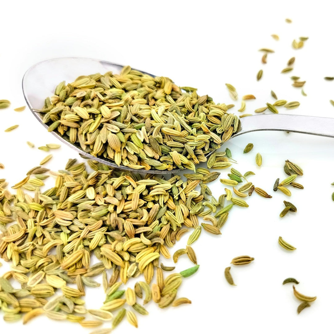 Organic whole fennel seeds in a clear 50g bag by AGT, showcasing their natural brown color and premium quality.