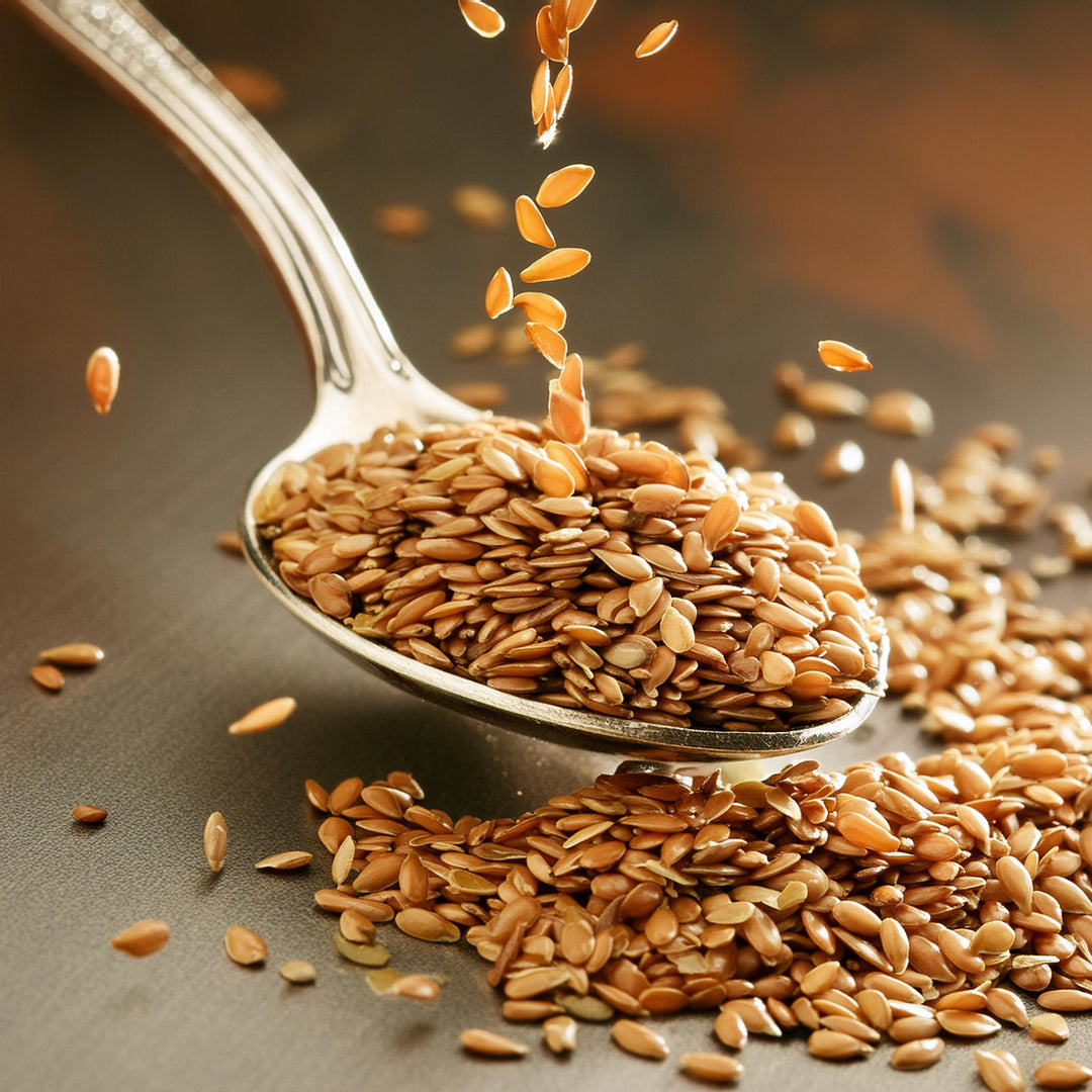 Golden whole flaxseeds in a clear bag, labeled AGT, ideal for baking and health.
