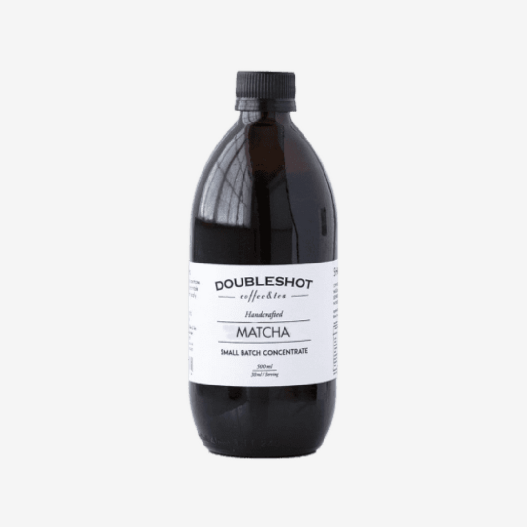 Green premium matcha concentrate bottle by Double Shot, ready to drink, ceremonial grade, artisanal beverage.