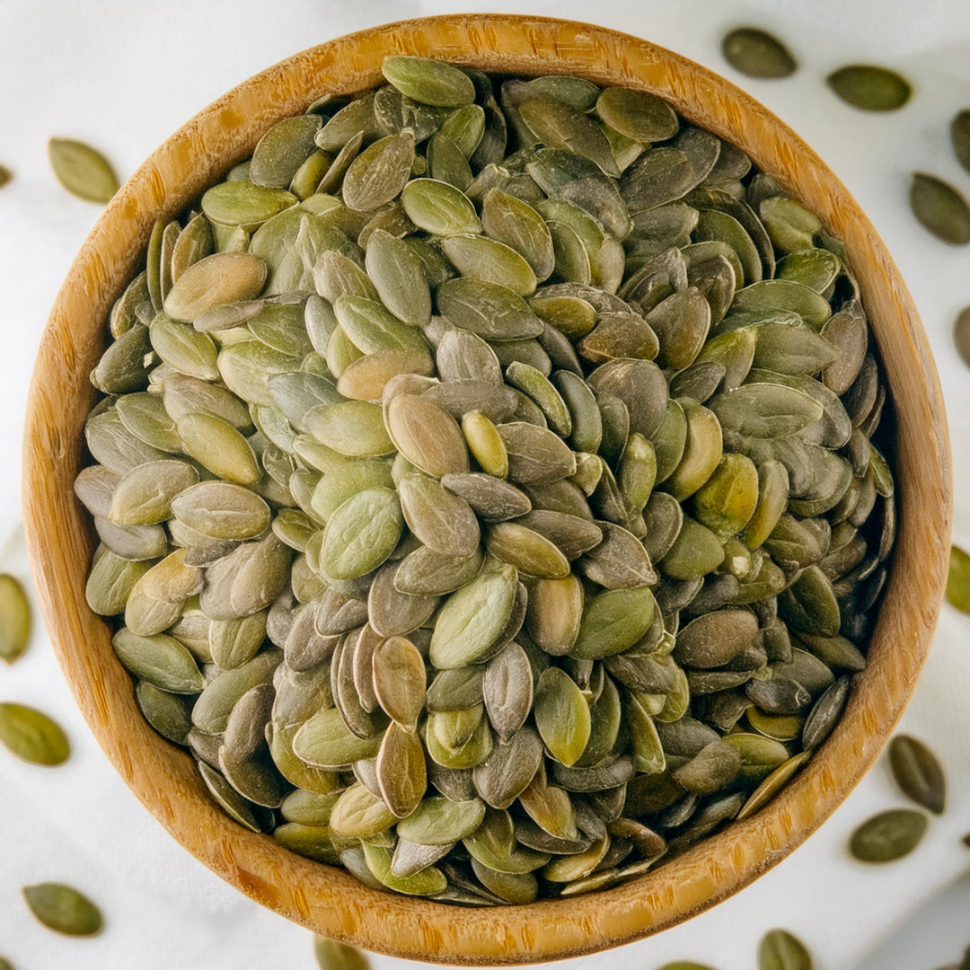 MultiSnack pumpkin seeds in a clear bag, gluten-free, keto-friendly, available in 50g, 150g, and 250g sizes.