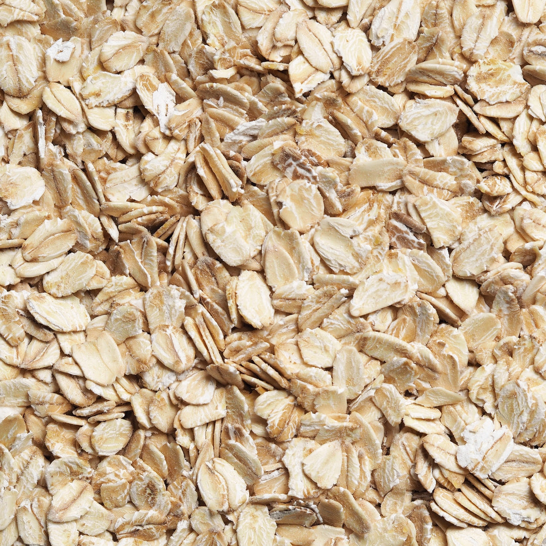 MultiSnack rolled oats in a clear bag, showcasing whole grain texture, available in 250g, 500g, and 1kg sizes.