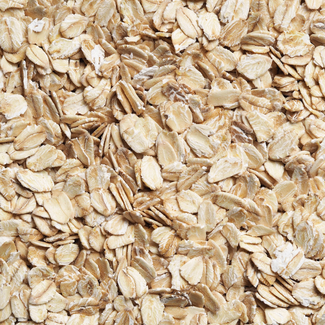 Organic gluten-free rolled oats in a clear bag, labeled Akalwayas, ideal for baking and breakfast.