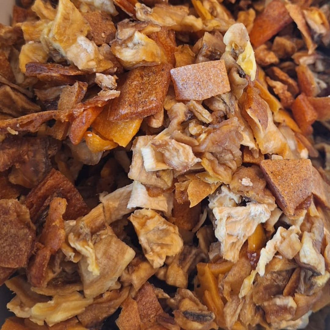 Colorful dried tropical fruit mix in a clear package by Afrifruta, available in 100g, 250g, and 500g sizes.