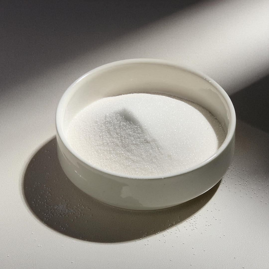 White granulated sugar in clear bag, DCL brand, available in 250g, 500g, and 1kg sizes for baking and cooking.