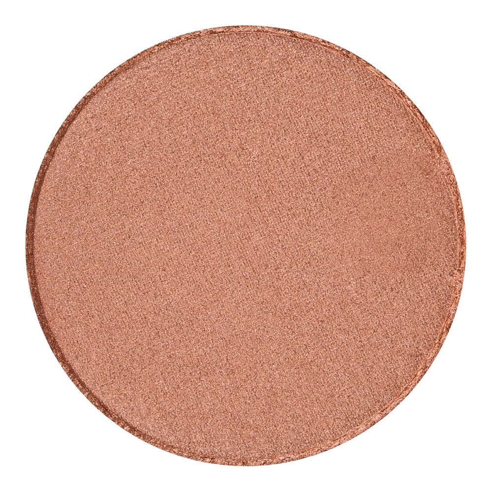 Pressed highlighter powder in Sunrise shade by Bodyography SA, featuring a smooth, shimmery finish for complexion enhancemen