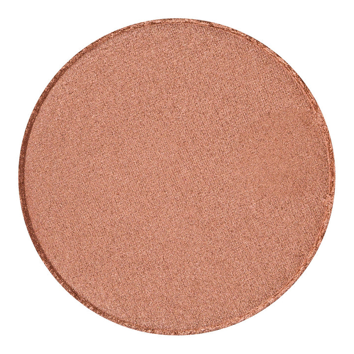 Pressed highlighter powder in Sunrise shade by Bodyography SA, featuring a smooth, shimmery finish for complexion enhancemen